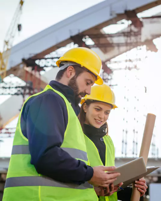 Engineers Looking on Tablet