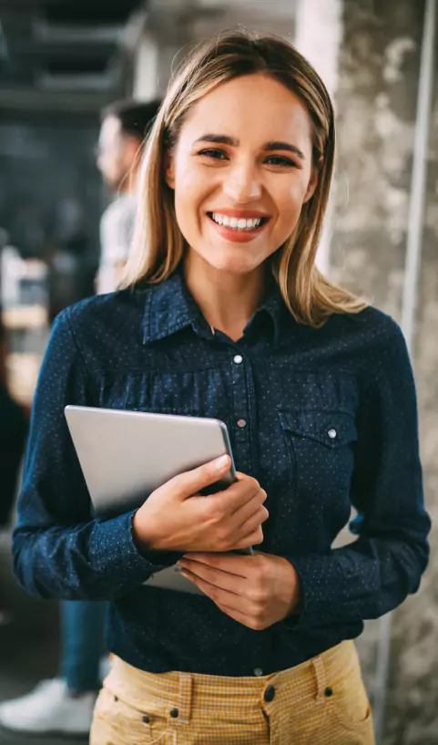 Woman Smiling Holding Laptop