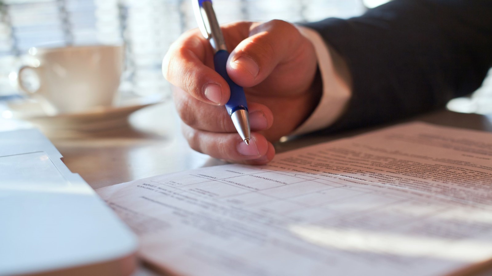 People's Hand Close-up Holding a pen