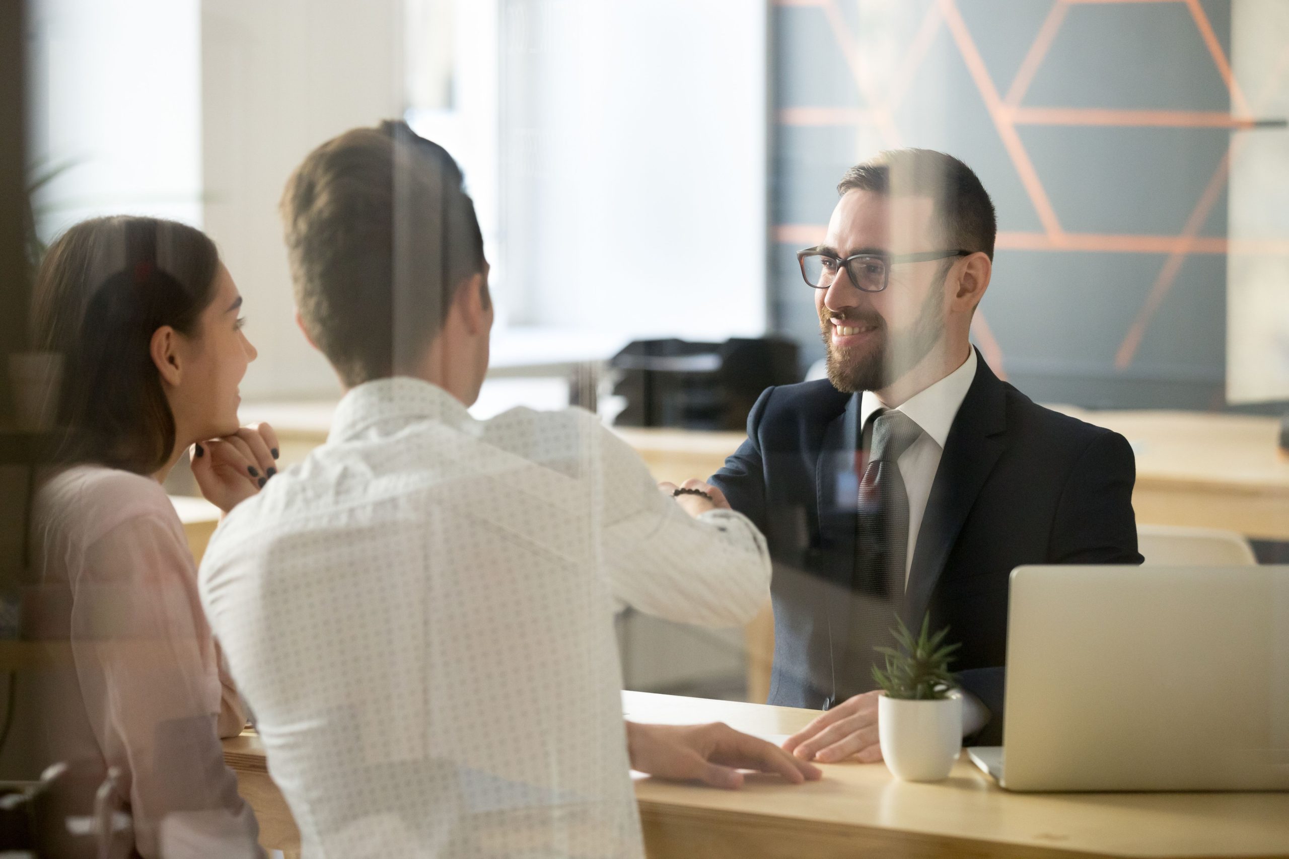 Professionals discussing A BOI Reporting Guide for Influential