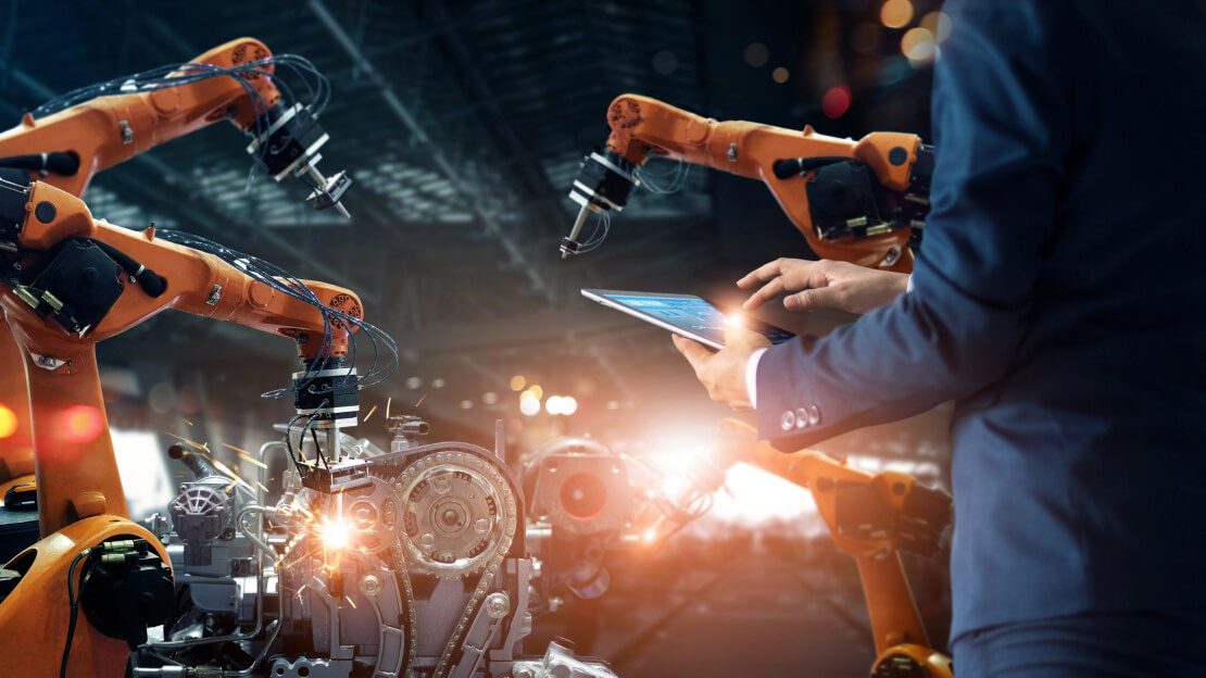Man using Tablet - Automation Process in Manufacturing