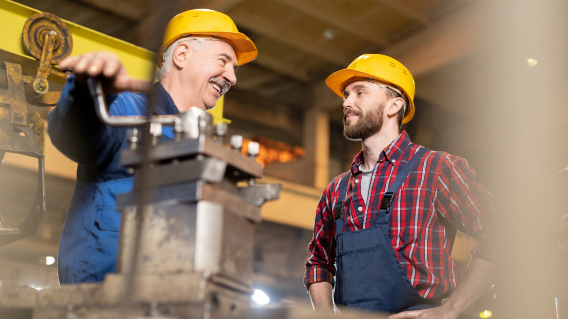 Two men wearing hard hat for safety