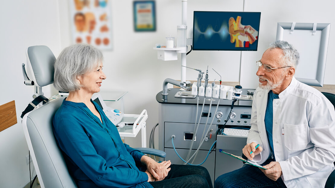 A Doctor and Patient in a medical office - Audiology