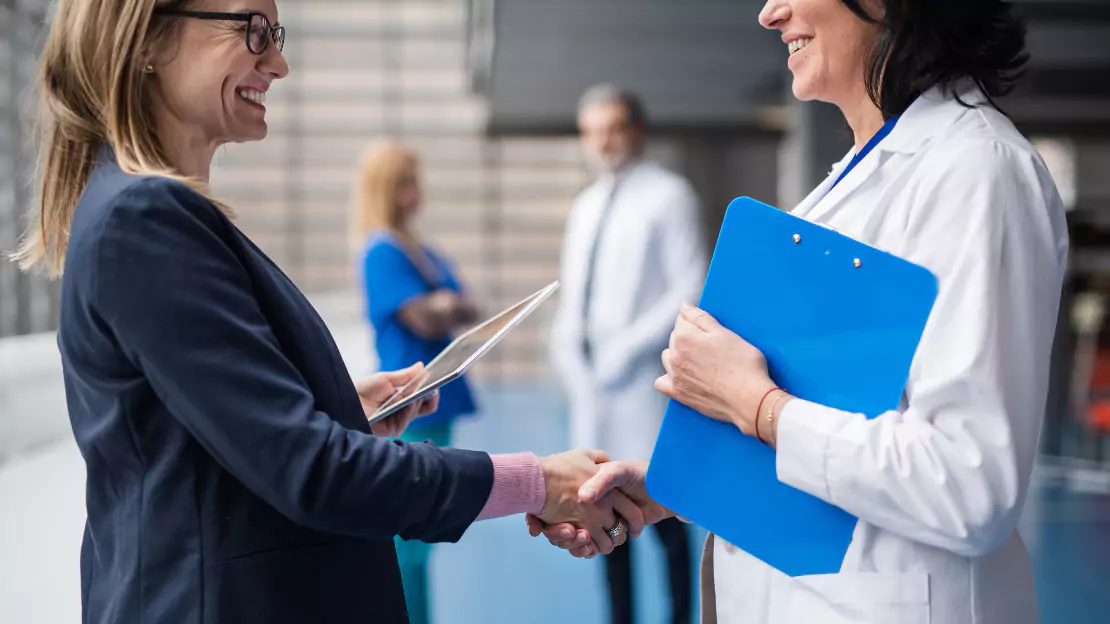 A person shaking hands with a person