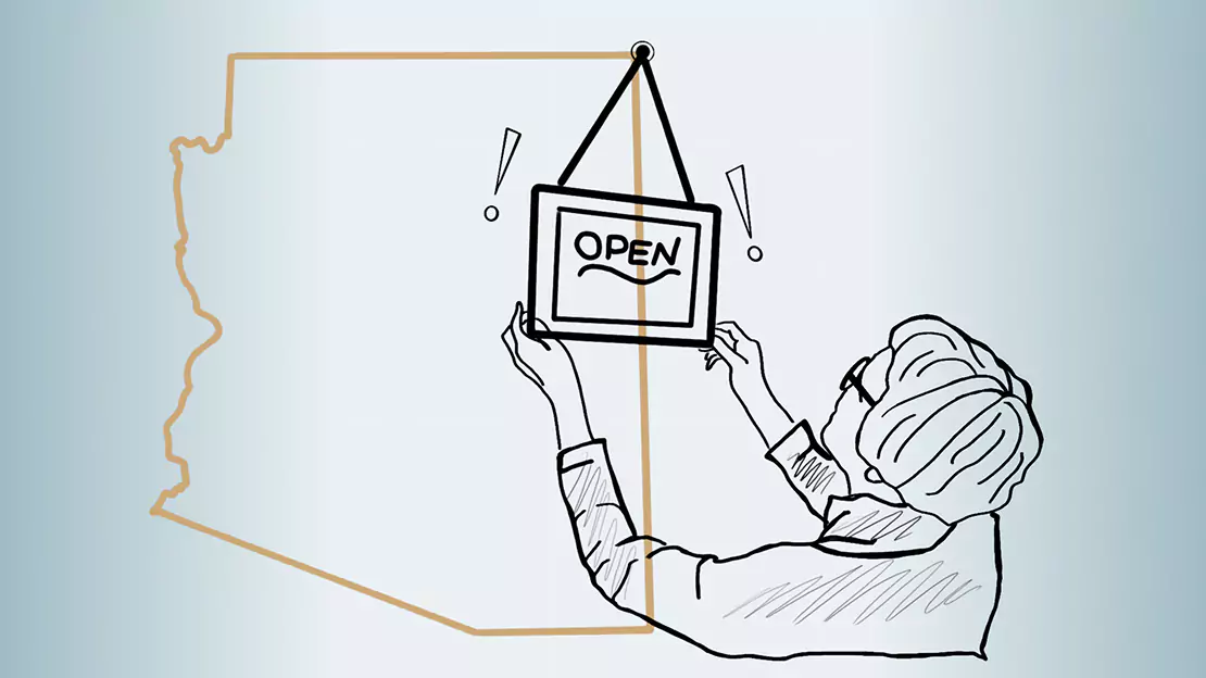 Business owner flipping the Open Signage