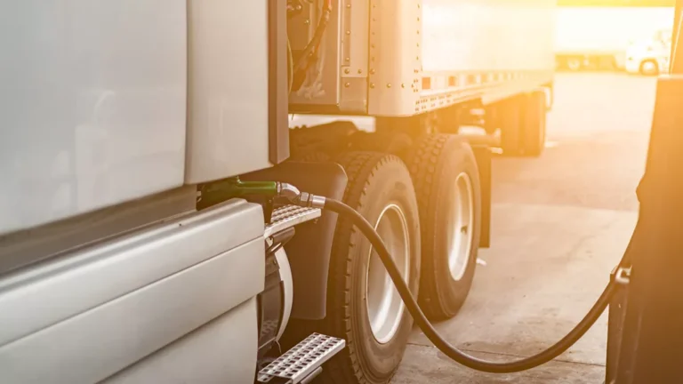 A truck is being refueled