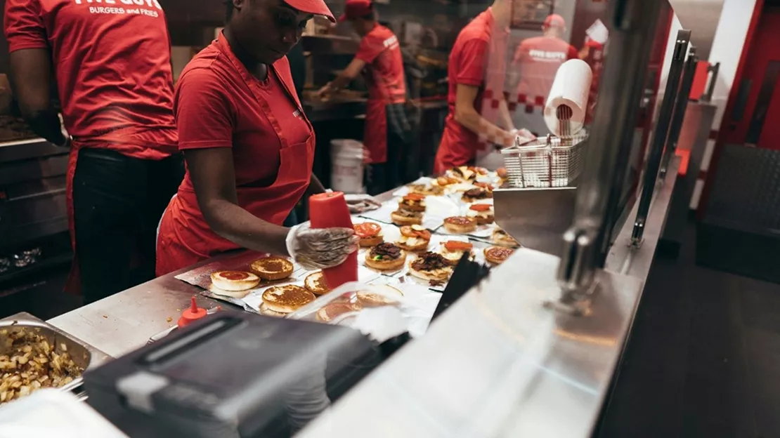 Staff are preparing the ordered meals