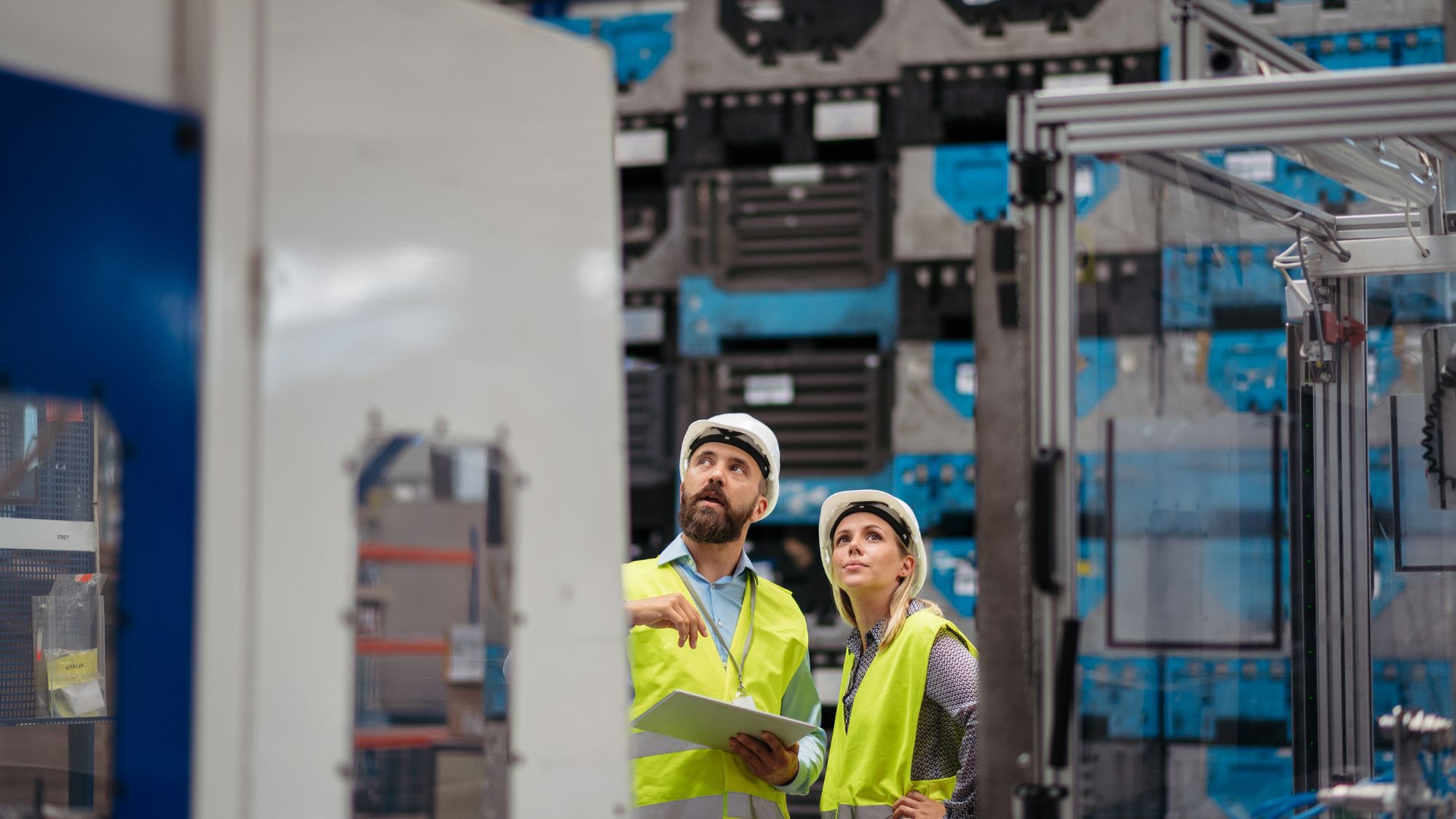 Manufacturing Staff Checking Machines