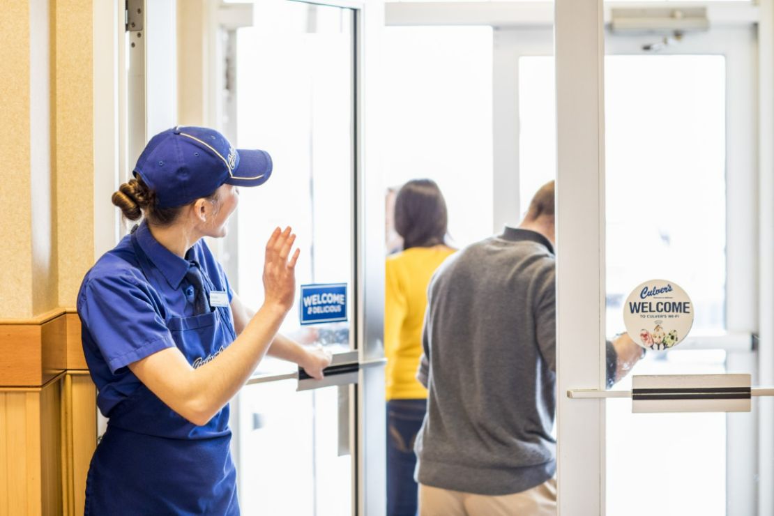 Restaurant Staff Welcoming Customers