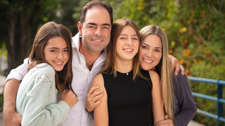 A Family Photo with Trees on the Background