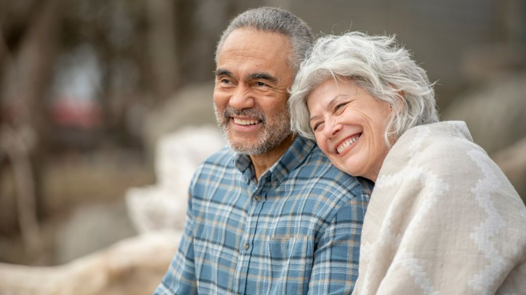An older couple is sharing a laugh together