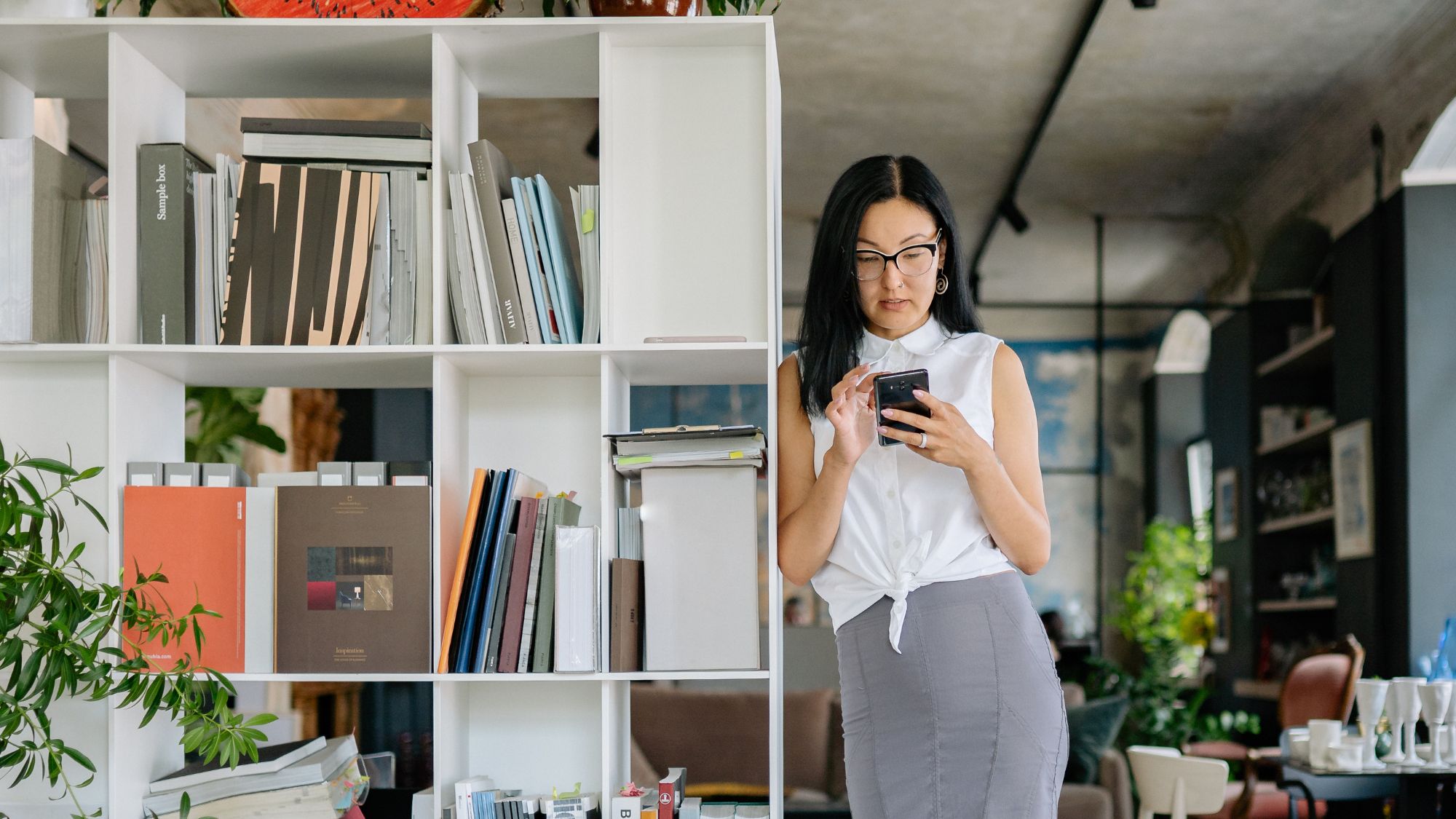 Business Owner Checking Her Phone