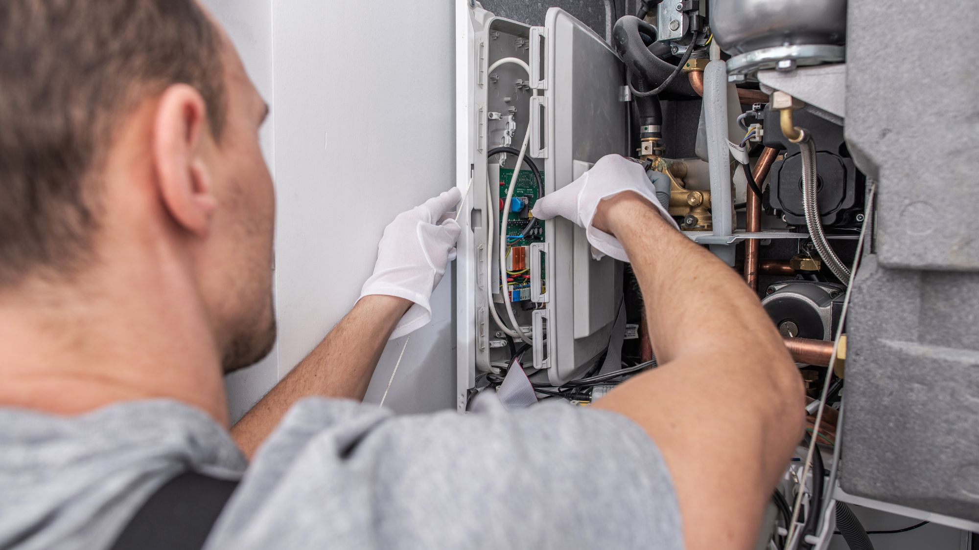 Technician performing equipment maintenance