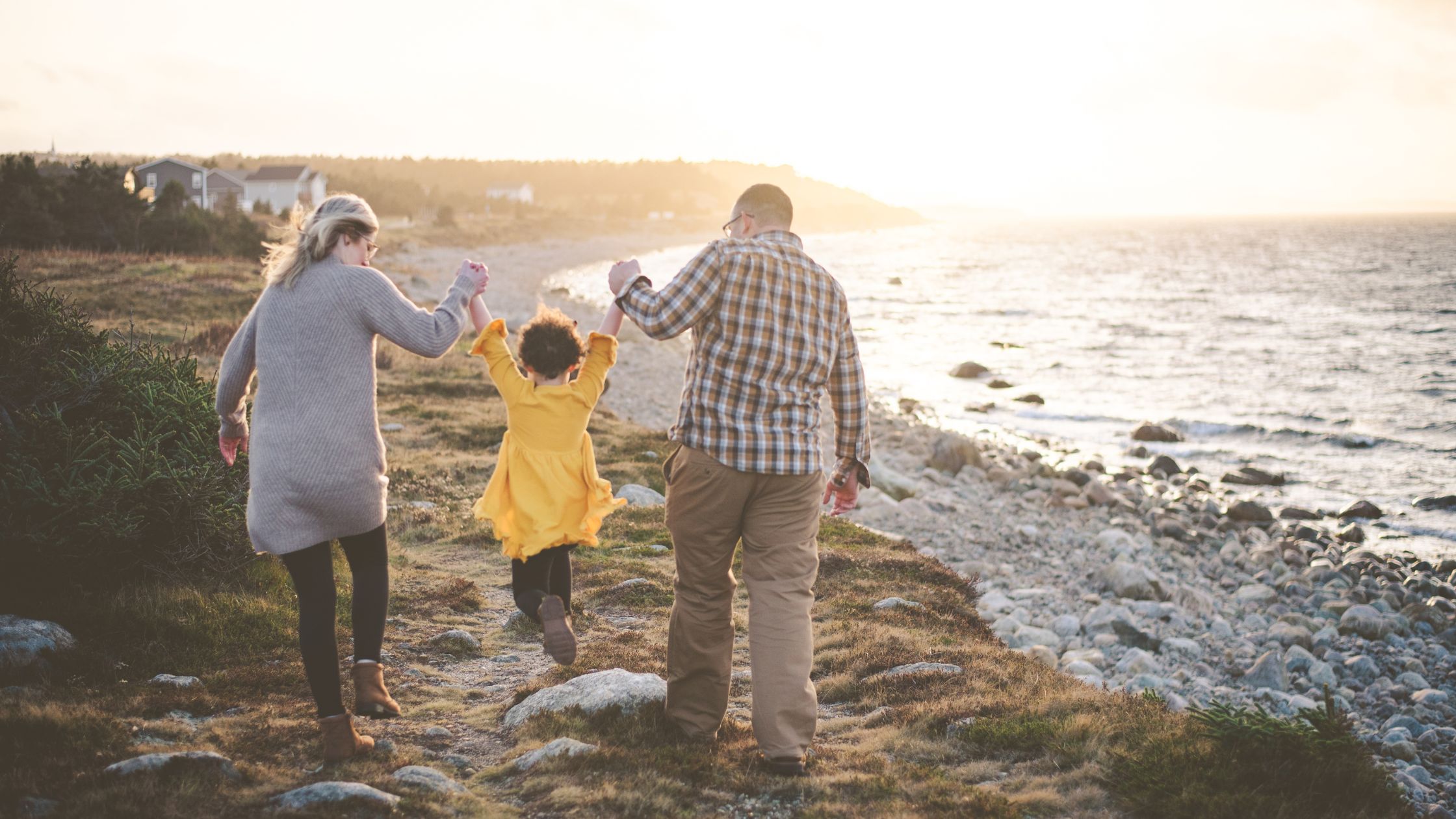 Family walking on beach