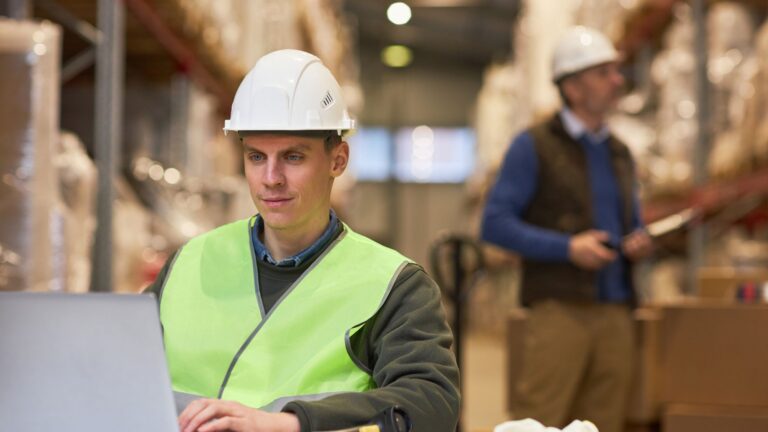 Man Wearing Safety Gear in Manufacturing